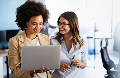 photo of two women talking