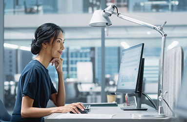 person typing on computer