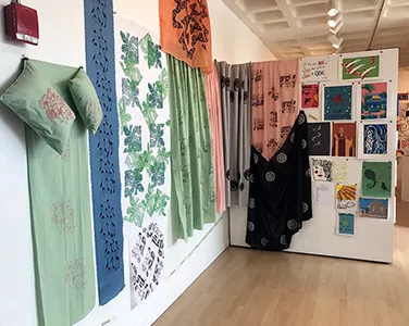 Examples of textiles and drawings from the Student Art Exhibit 2019
