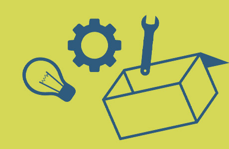 Drawing of a box with a lightbulb, a gear, and a wrench