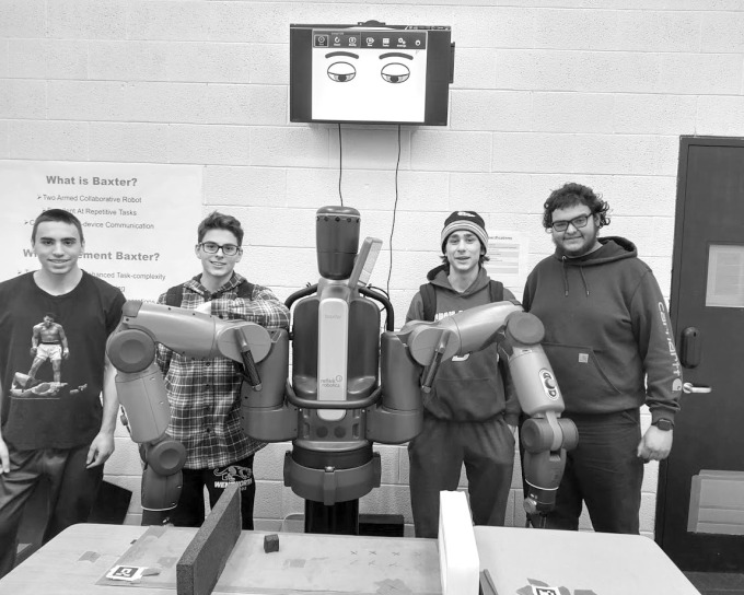 Group of students with Baxter the robot